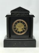 Victorian black slate mantle clock, black and gilt circular Roman dial,