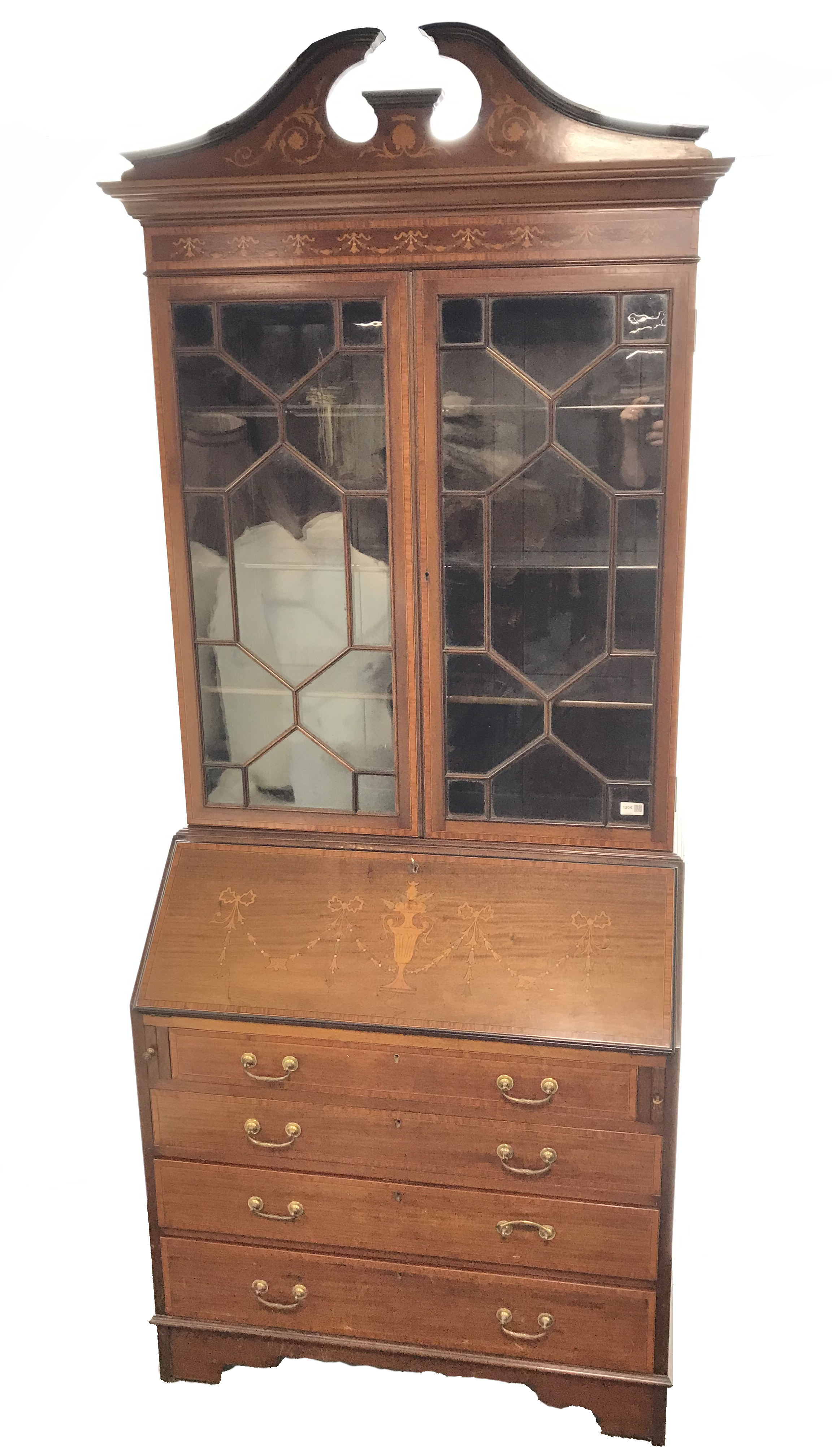 Edwardian inlaid mahogany bureau bookcase, broken swan neck pediment, two astragal glazed doors,