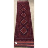 Meshwani red ground runner, geometric patterned field,