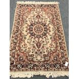 Persian design pale green ground rug, central medallion, repeating border,