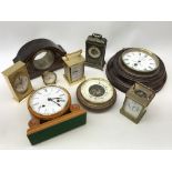 Collection of clocks including: brass half hour striking carriage clock, German wall clock, Widdop,