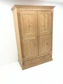 Solid pine wardrobe, projecting cornice, two doors enclosing hanging rail above two drawers,