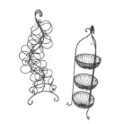 Shaped wrought metal bottle rack (H102cm) and a similar fruit stand (H94cm (2) Condition