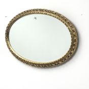 Oval gilt framed bevel edge mirror, W72cm,