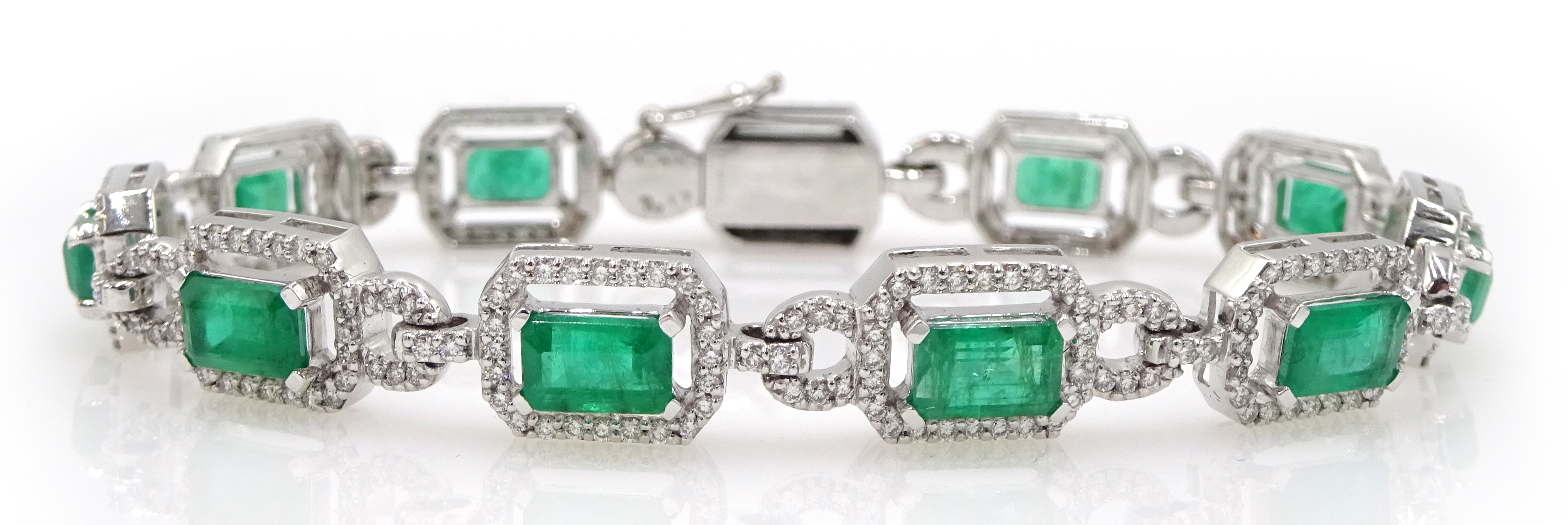 18ct white gold emerald cut emerald and round brilliant cut diamond bracelet, hallmarked,