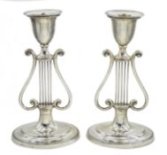 Pair of Edwardian silver stylized harp candlesticks by Sibray, Hall & Co Ltd, London 1911, H19.