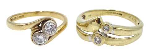 Gold two diamond stone crossover ring and one other similar set with two diamonds,