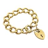 9ct gold curb chain bracelet with barrel clasp and heart locket, London 1968, approx 47.