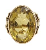 Rose gold oval citrine ring, with open work gallery,