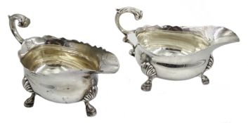 Pair of silver sauce boats,double C scroll handle on three hoof feet by Z Barraclough & Sons,