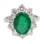 White gold oval emerald and round brilliant cut diamond ring, stamped 750, emerald approx 2.