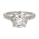 Platinum old cut diamond solitaire ring with diamond set shoulders, hallmarked, central diamond 2.