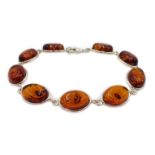 Silver oval Baltic amber bracelet, stamped 925 Condition Report <a href='//www.