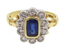 18ct gold emerald cut sapphire and round brilliant cut diamond cluster ring,