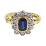 18ct gold emerald cut sapphire and round brilliant cut diamond cluster ring,