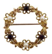 9ct gold pearl and garnet circular flower brooch,