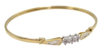 9ct gold bangle, the clasp set with three chip diamonds,