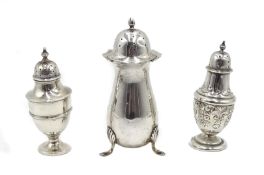 Edwardian silver pepperette by William Adams Ltd, Birmingham 1905 and two others both hallmarked,