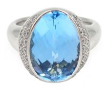 18ct white gold oval briolette cut blue topaz, with diamond surround, makers mark JD,