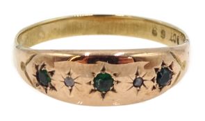 Gold emerald and diamond five stone gypsy ring,