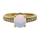 Silver-gilt opal ring, cubic zirconia set shoulders,