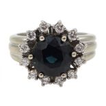 18ct white gold round teal blue synthetic sapphire and diamond cluster ring,