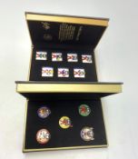 Two cased sets of Robertsons enamel Golly badges, The Gollympic Games, and Golly's Diary.