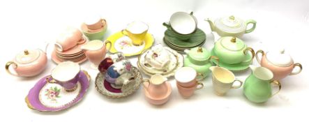 A Wedgwood bone china pink glazed teaset for six, comprising teapot,