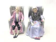 A pair of Royal Doulton bookend figurines, Joan HN2023 and Darby HN2024,