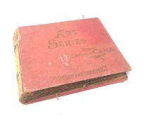 Victorian scrap book containing various cuttings and small greetings cards, all glued down,
