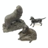 A Beswick figurine, modelled as a black Labrador, with printed mark beneath,
