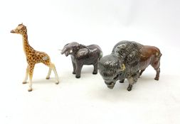 A group of three Beswick figurines, comprising Bison, Elephant and Giraffe,