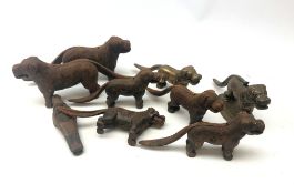 Eight cast iron and brass nut crackers in the form of dogs and another in the form of a gnome (9)