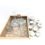 A modern clear glass ships decanter with stopper,