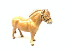 A Beswick figurine, modelled as a Norwegian Fjord horse, model no 2282, with printed mark beneath,