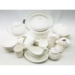 Wedgwood Candlelight pattern dinner service comprising ten dinner plates, six side and tea plates,