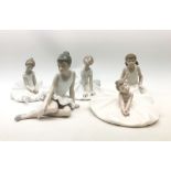A group of five Nao figurines, each modelled as ballet dancers in various poses,