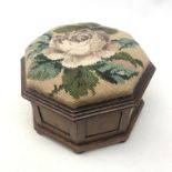 Victorian mahogany octagonal footstool with upholstered hinged top on bun feet,