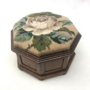 Victorian mahogany octagonal footstool with upholstered hinged top on bun feet,