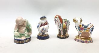 A group of four Royal Worcester candle snuffers from The Connoisseur Collection,