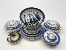 A Booths 'Real Old Willow' pattern part service, comprising two tureens and covers, an oval platter,