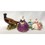 Two Royal Doulton figurines, the first The Love Letter HN2149, the second Charlotte HN2421,