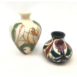 Two small Moorcroft vases, the first of baluster form decorated in the Crocus pattern,