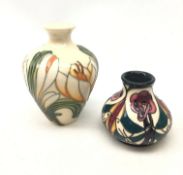 Two small Moorcroft vases, the first of baluster form decorated in the Crocus pattern,