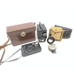A WWII mark III compass by T G Co Ltd, together with a cased Dekko cine camera,