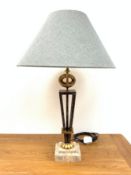 Large gilt and simulated stone table lamp of tapered form on stepped polished stone effect base,