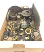 Collection of brass ware including horse brasses, Eastern ashtray, hub caps,