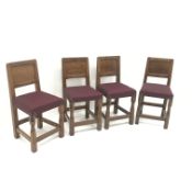 Set four Gnomeman dining chairs, adazed solid panelled back, upholstered seat,