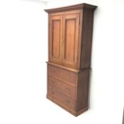 19th century pine press cupboard, projecting cornice above two doors enclosing fitted interior,