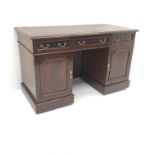 Early 20th century mahogany twin pedestal desk, leather inset top, two short and one long drawer,